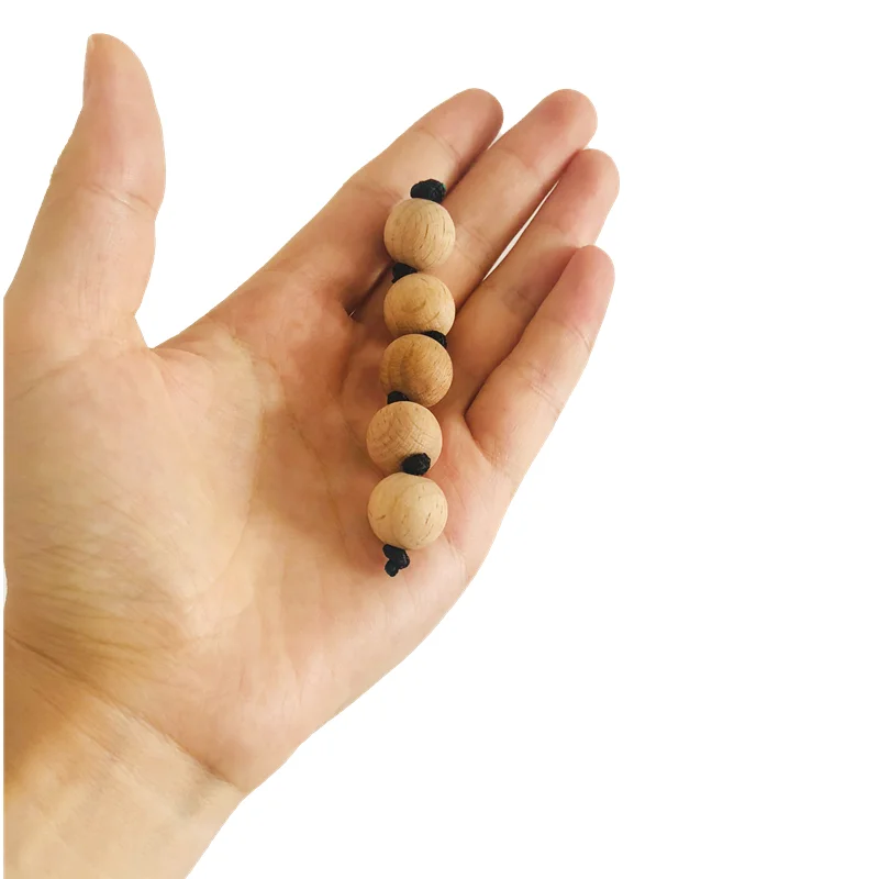 ألعاب الخرز الخشبي مونتيسوري ل - مراجعة Musical Instrument Rattle وسعره