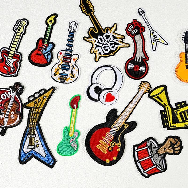 شارة غيتار مُطَّرزة لحقيبة الظ - مراجعة Musical Instrument Photo وسعره