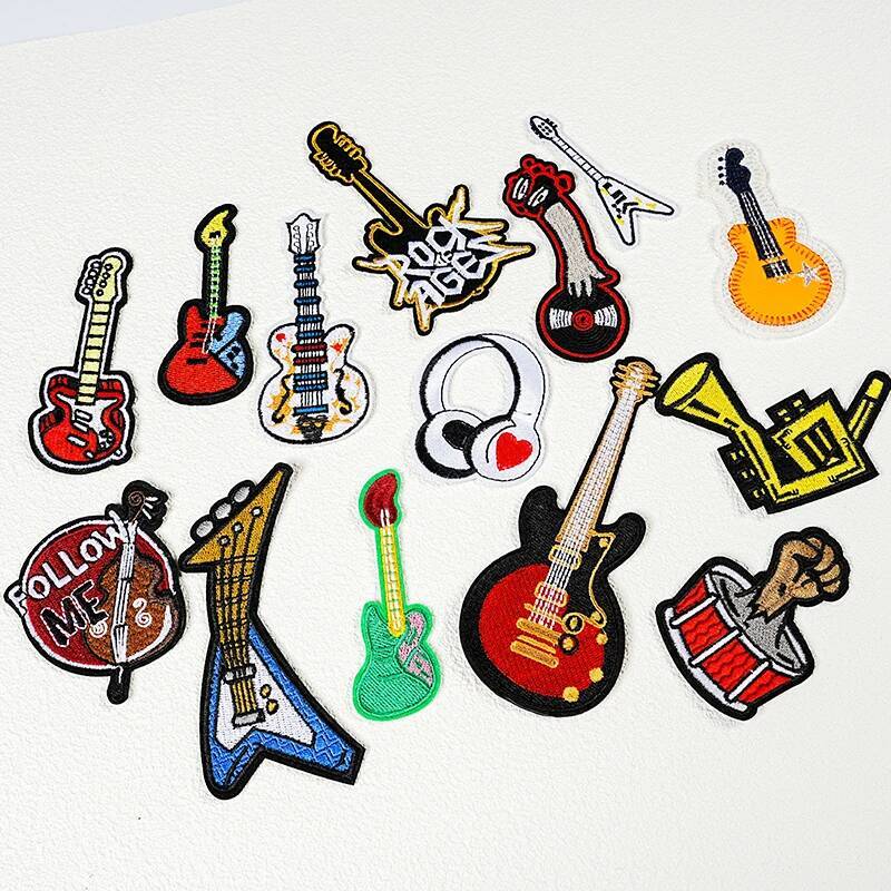 شارة غيتار مُطَّرزة لحقيبة الظ - مراجعة Musical Instrument Photo وسعره